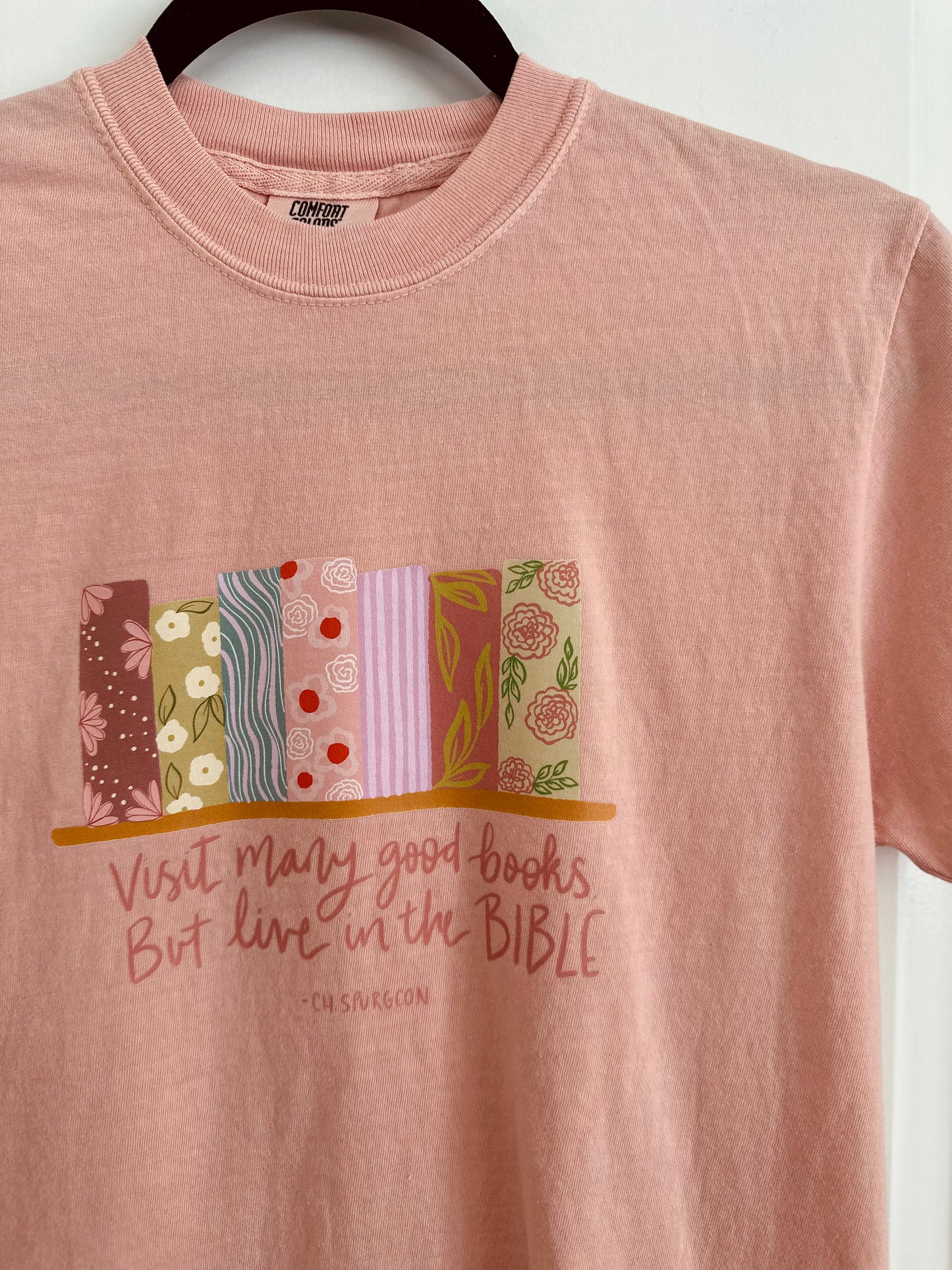 Read Many good books, but live in the Bible - Charles Spurgeon | Comfort Colors Tshirt