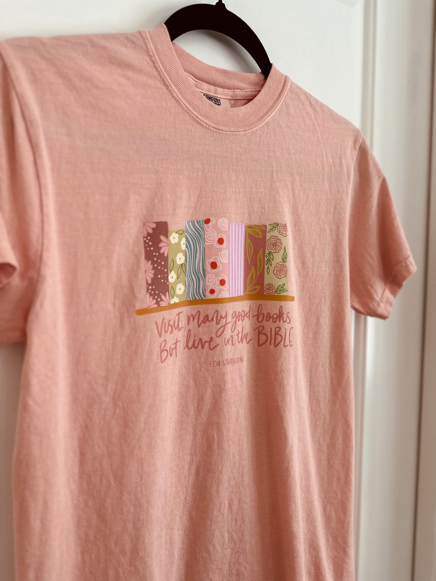Read Many good books, but live in the Bible - Charles Spurgeon | Comfort Colors Tshirt