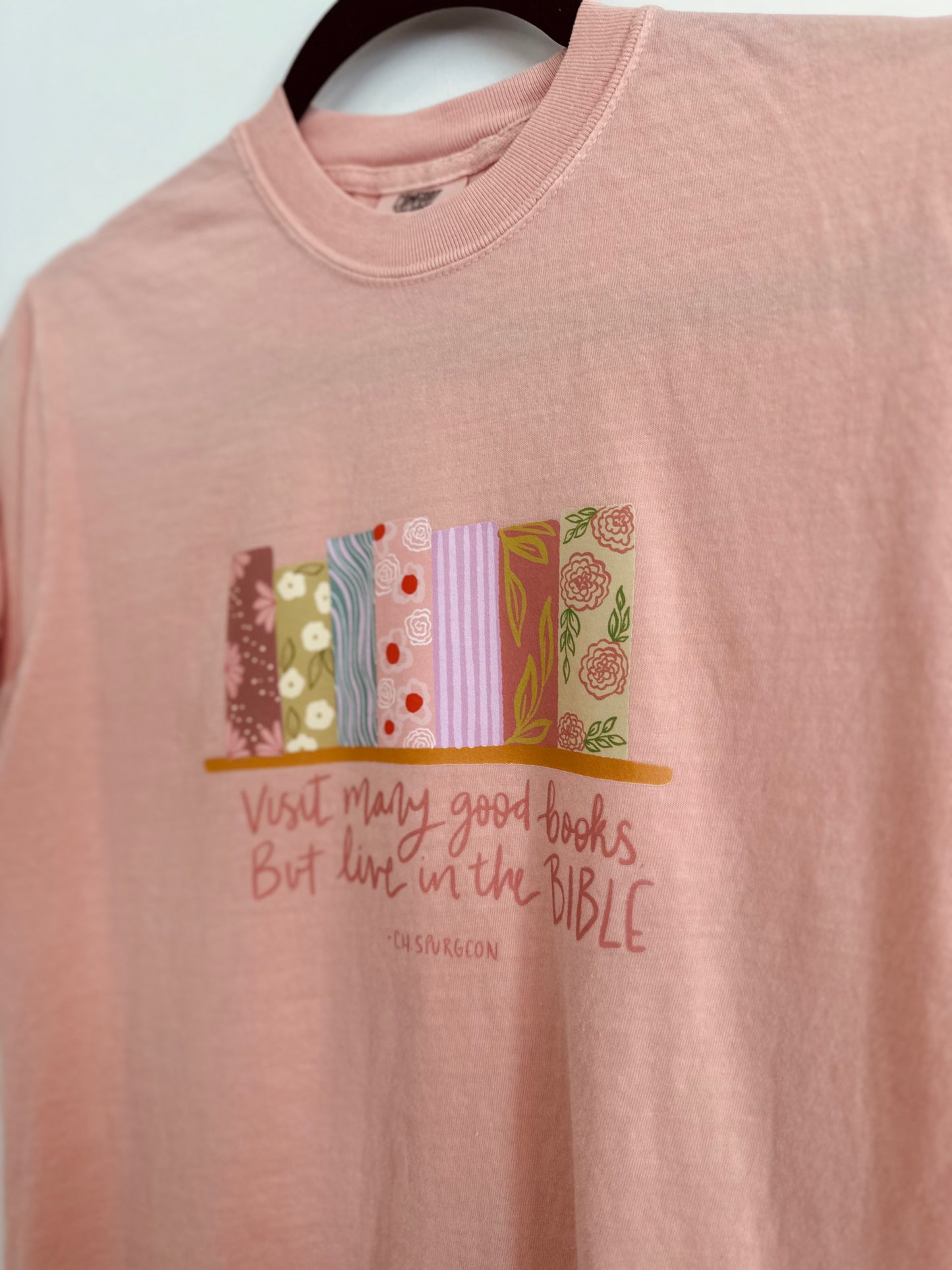 Read Many good books, but live in the Bible - Charles Spurgeon | Comfort Colors Tshirt