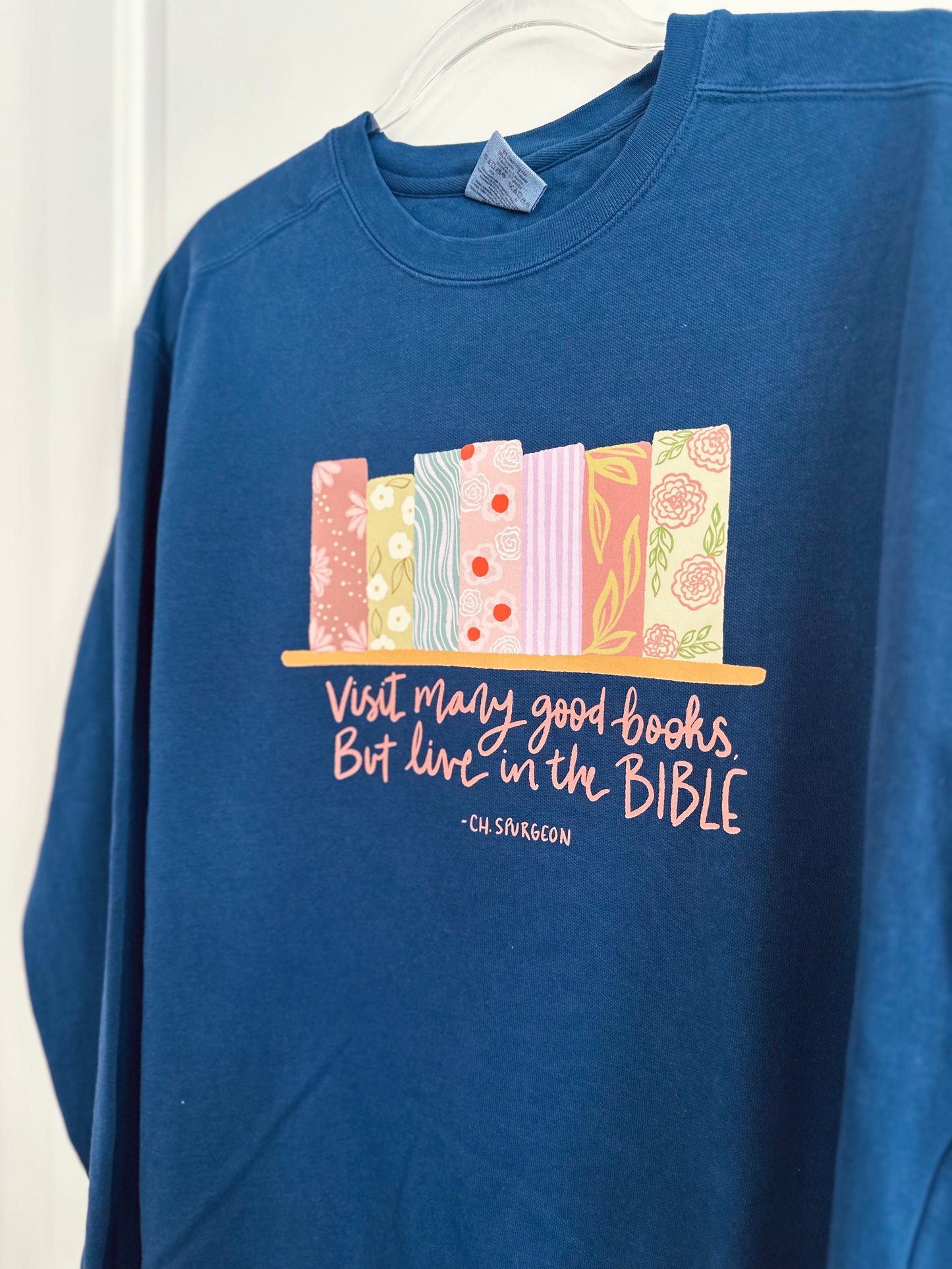 Read many good books but live in the Bible - Charles Spurgeon | Comfort Colors Crewneck